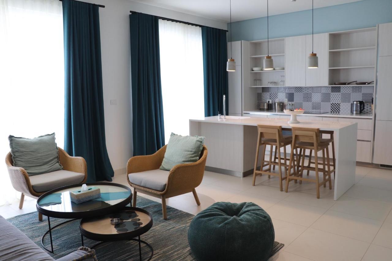 Cloud 7 Residences Ayla Aqaba Eksteriør billede A 3D rendering of a living room